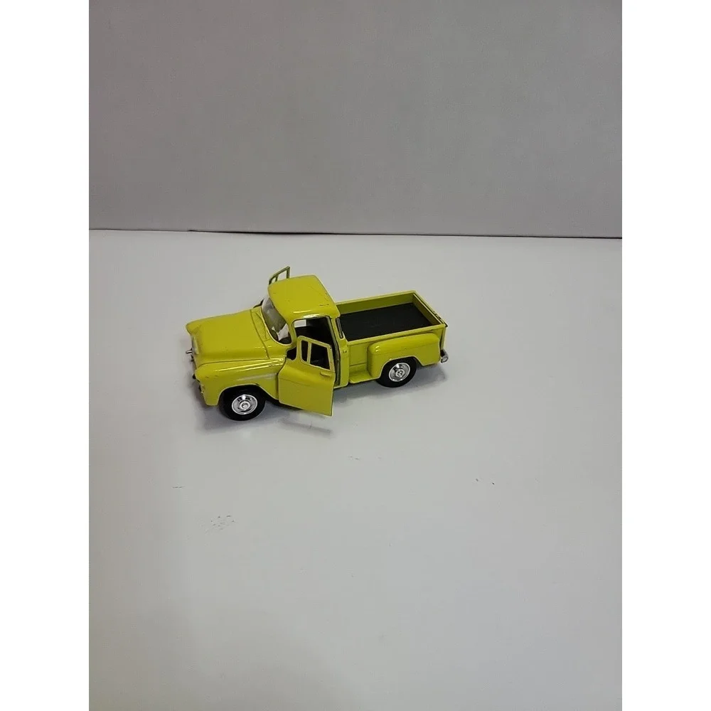 Kinsmart Pull Back Yellow 1955‎ Chevy Stepside Pickup Truck with Surfboard 1:32
